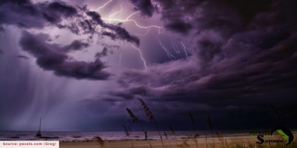 Storm clouds and lightning over the sea
